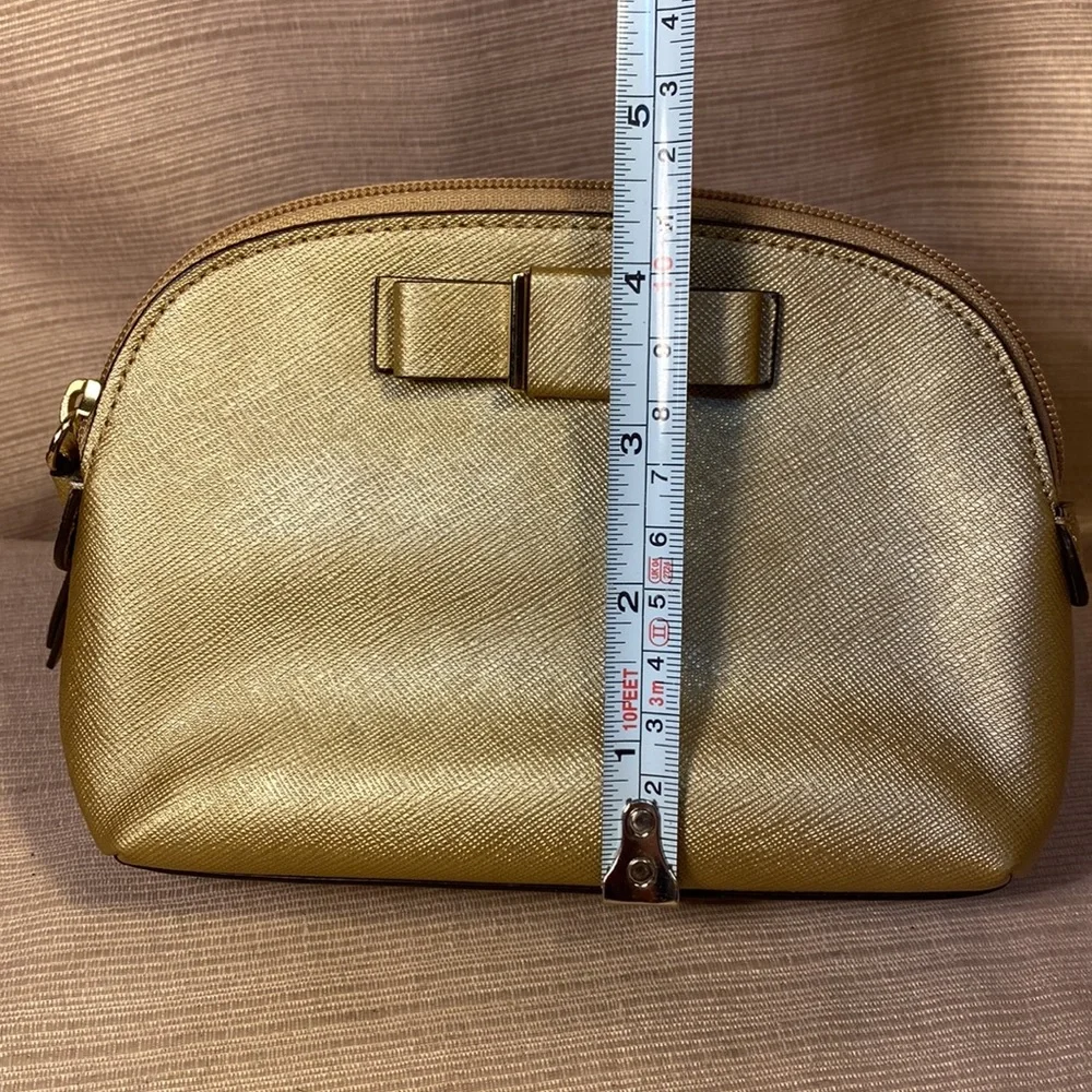 Coach gold metallic color cosmetic pouch w/elegant bow
